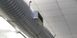 metal tube for the air-conditioning of a large workshop