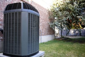 Commercial HVAC system is installed in the backyard of the house
